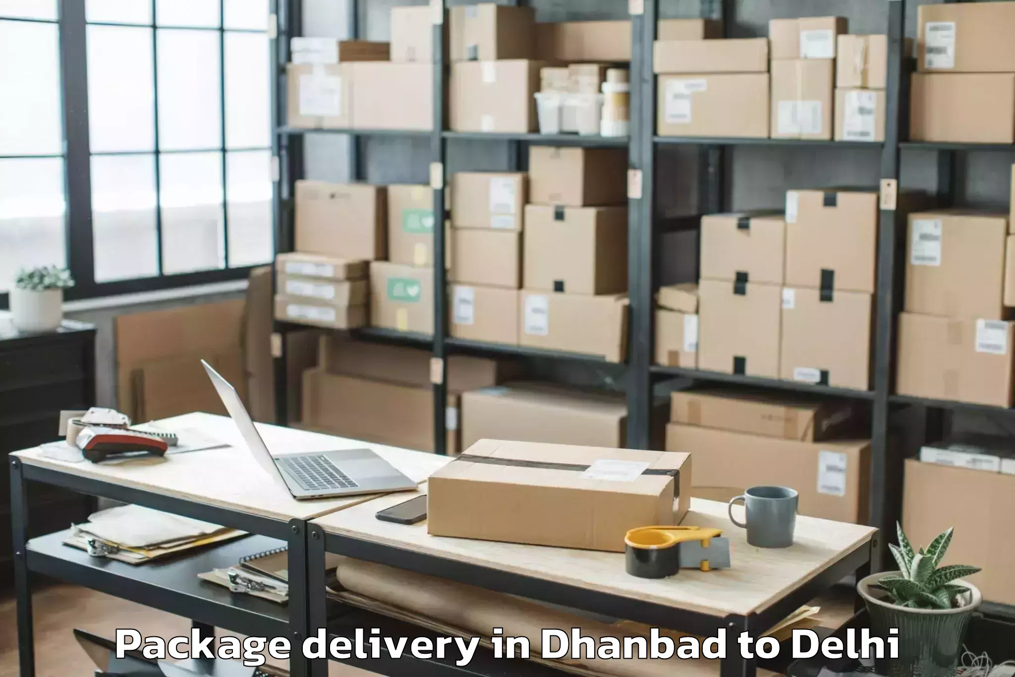 Dhanbad to Rashtriya Sanskrit Sansthan Un Package Delivery